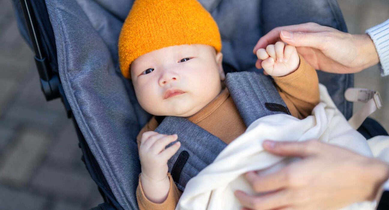 Baby im Kinderwagen