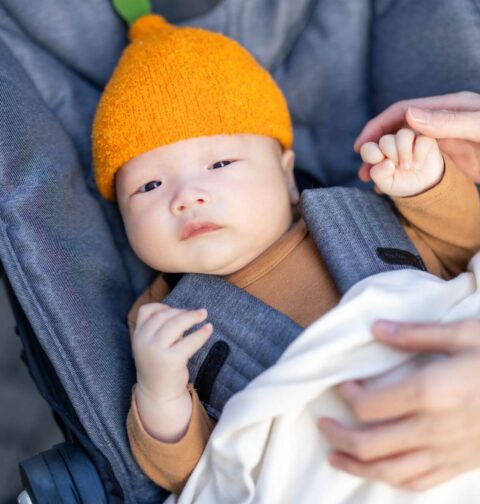 Baby im Kinderwagen